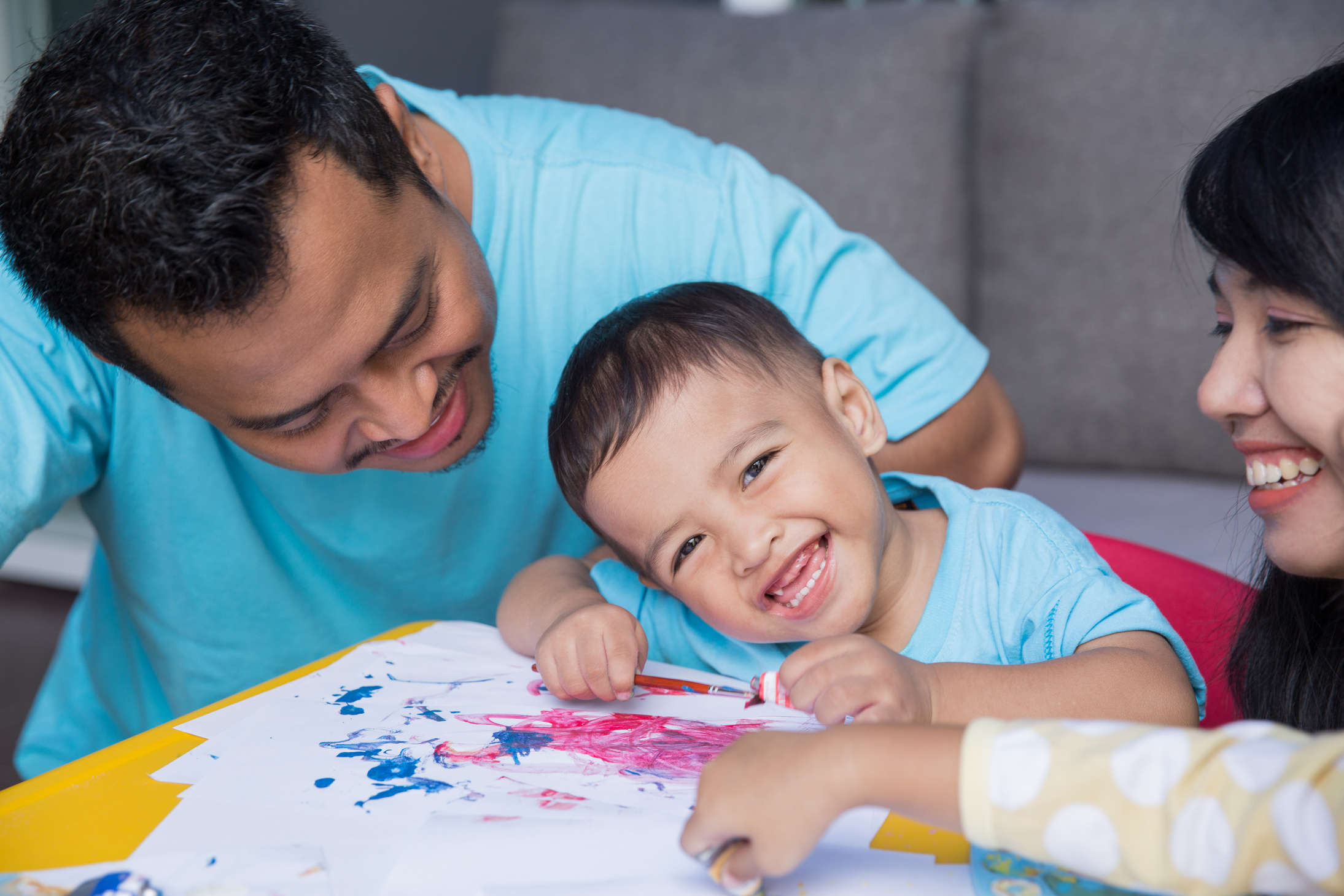 asian kid painting and drawing